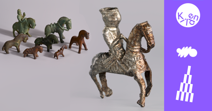 Sm? figurer av dyr og en ridder som sitter p? en hest.