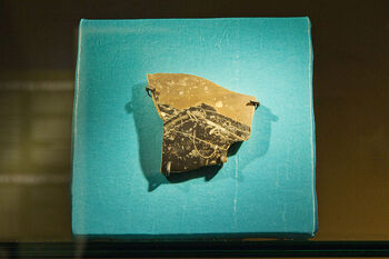 Rectangle ,Natural material ,Artifact ,Amber ,Triangle.