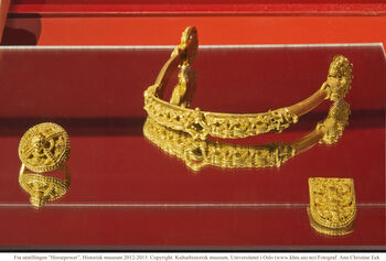 Gold ,Amber ,Artifact ,Font ,Metal.
