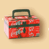 Suitcase made of wood and covered with Coca-Cola cans discarded by a local manufacturer.