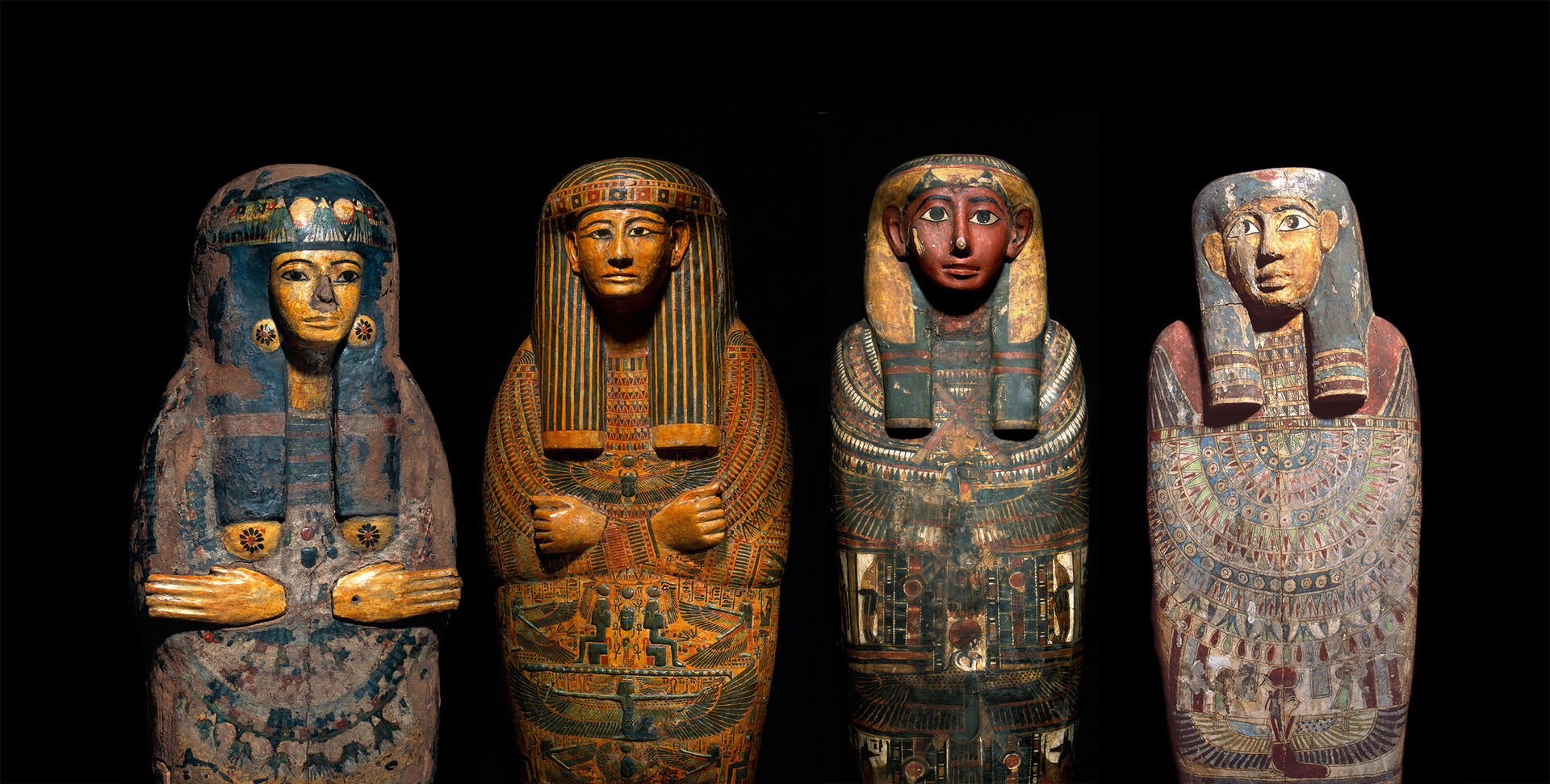 Four mummy sarcophagi
