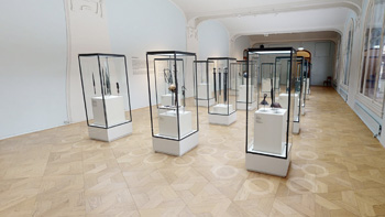 An exhibition room with several exhibition stands