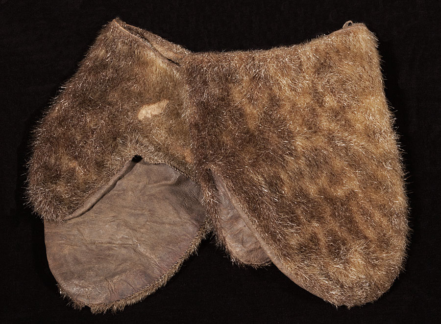 Bildet kan inneholde: brun, mørke, beige, naturlig materiale.