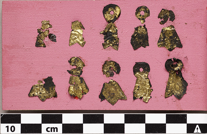 Golden appliques made of silver and gold foil.