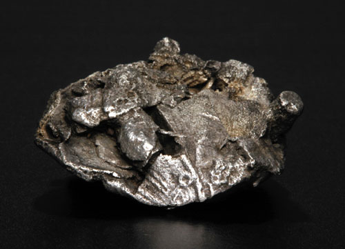 Bildet kan inneholde: mineral, metall, stein, sølv.