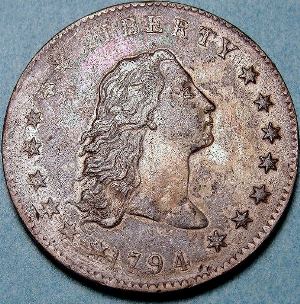 Bildet kan inneholde: mynt, valuta, penger, metall, gjenstand.